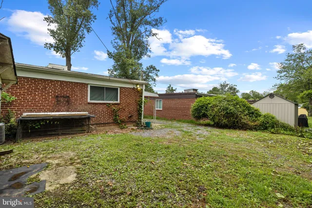 a house view with a backyard space