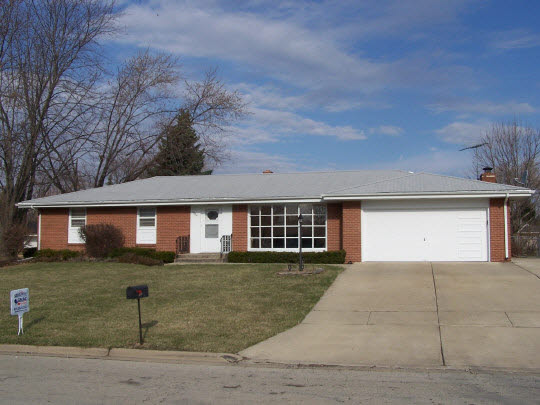 5408 Brookview Road Rockford, IL 61107 - Photo 1 of 1 front view of a house with a yard