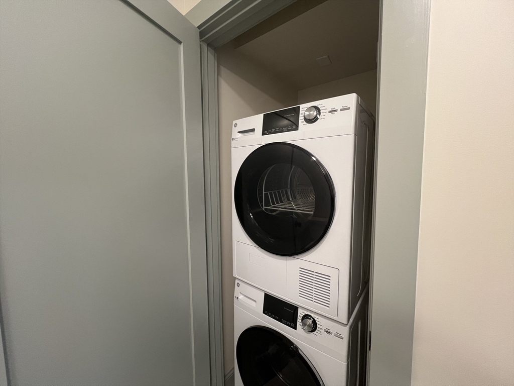 160 Seabury Street, Unit 32 Fall River, MA 02720 - Photo 3 of 14 a close up view of a washer and dryer