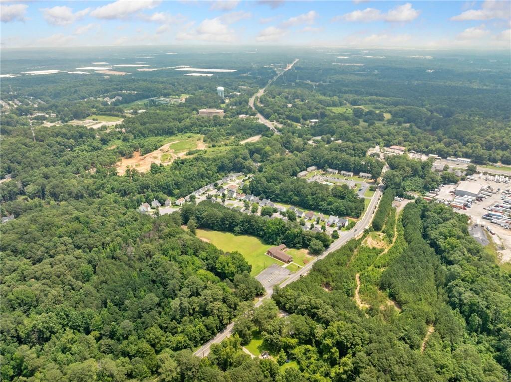 0 Highpoint Road Northeast Atlanta, GA 30331 - Photo 4 of 9 an aerial view of residential houses with outdoor space and trees