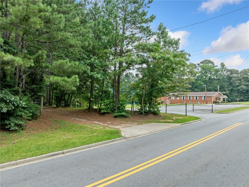 0 Highpoint Road Northeast Atlanta, GA 30331 - Photo 7 of 9 a view of a street with houses