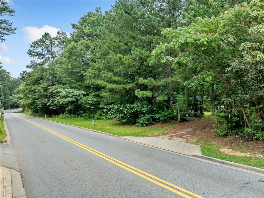 0 Highpoint Road Northeast Atlanta, GA 30331 - Photo 8 of 9 a view of a yard with a street