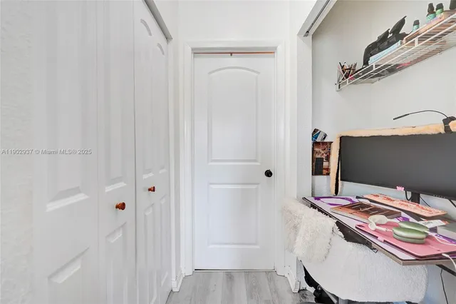 a workspace with furniture and wooden floor
