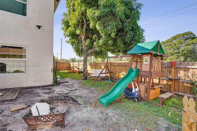 a view of a park with slide