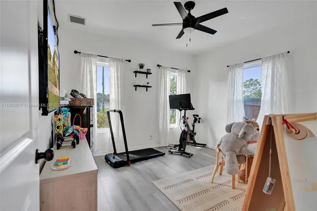 a view of a room with gym equipment