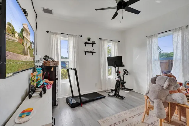a view of a room with gym equipment