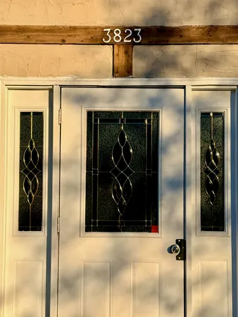 a sign that is sitting in front of flowers