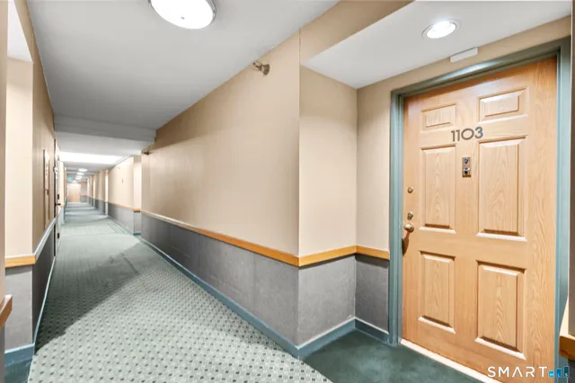 a view of a building with a yard