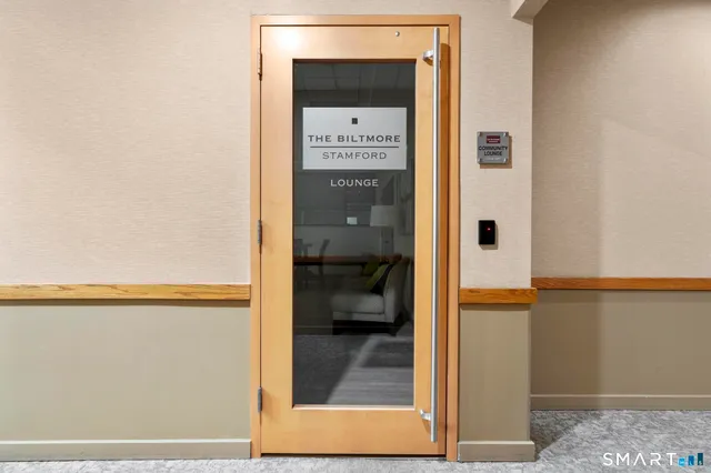 a group of people sitting at tables in a room