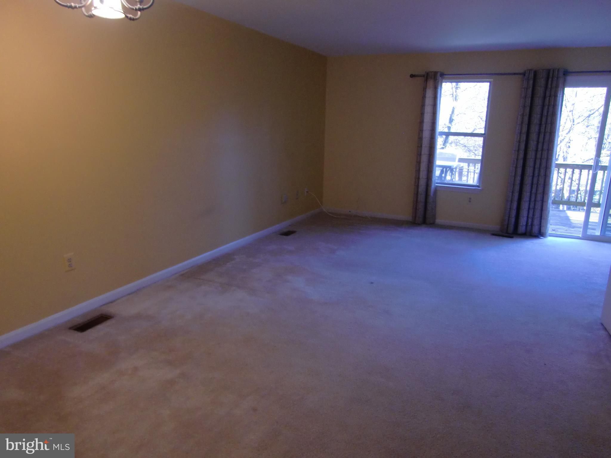 9545 Clocktower Lane Columbia, MD 21046 - Photo 6 of 25 huge dining room/ living room with NEW sliders