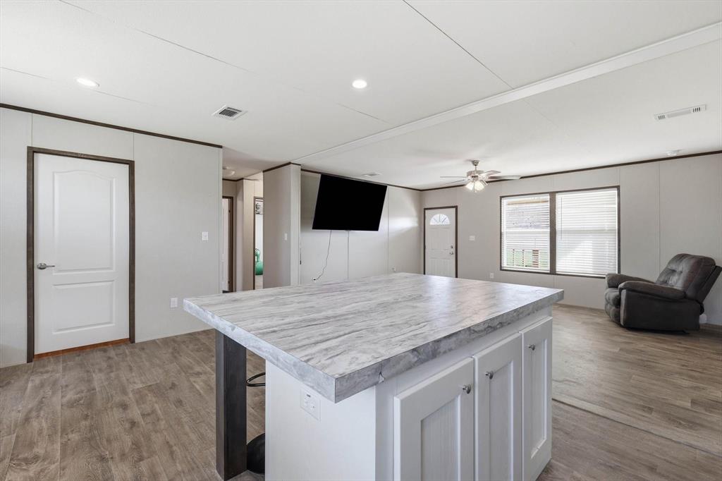 7553 Hutcheson Hill Road Springtown, TX 76082 - Photo 19 of 40 Kitchen to living