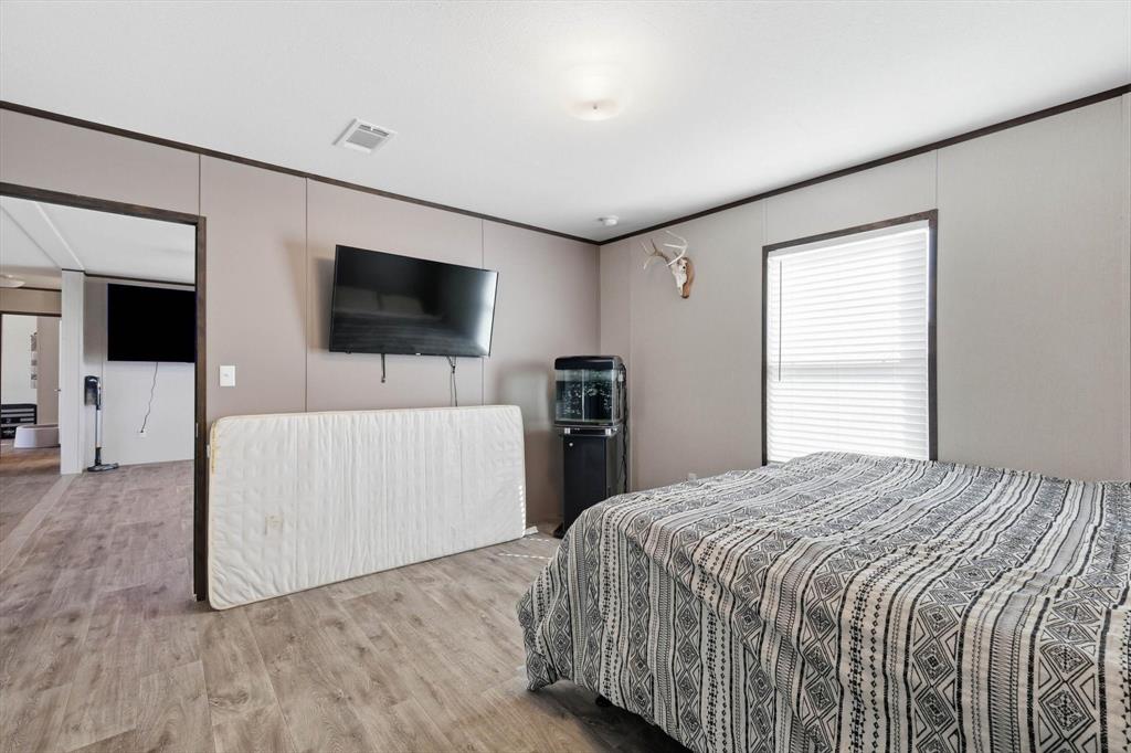 7553 Hutcheson Hill Road Springtown, TX 76082 - Photo 21 of 40 Primary bedroom