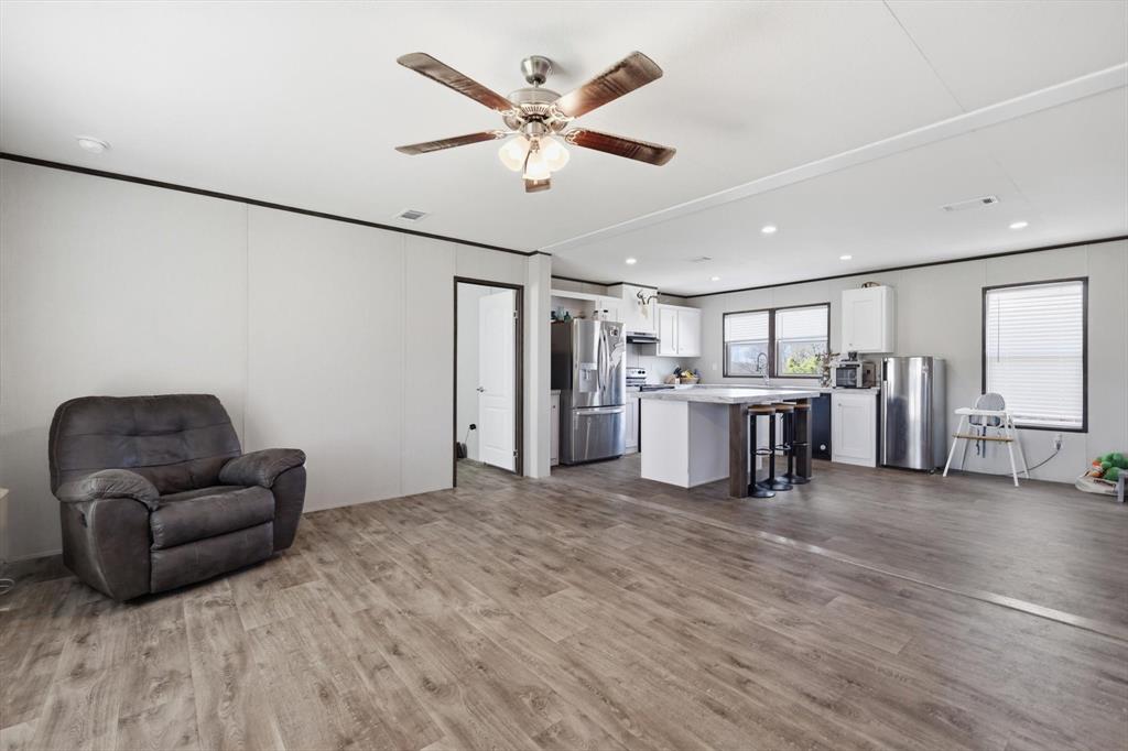 7553 Hutcheson Hill Road Springtown, TX 76082 - Photo 8 of 40 living to kitchen