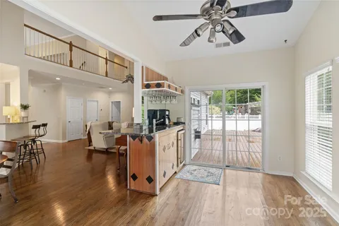 a view of livingroom with furniture window and wooden floor