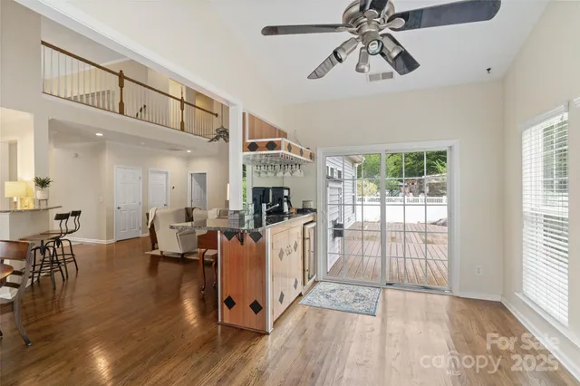 a view of livingroom with furniture window and wooden floor