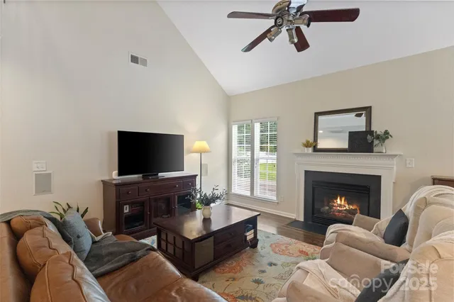 a bathroom with a sink mirror and vanity