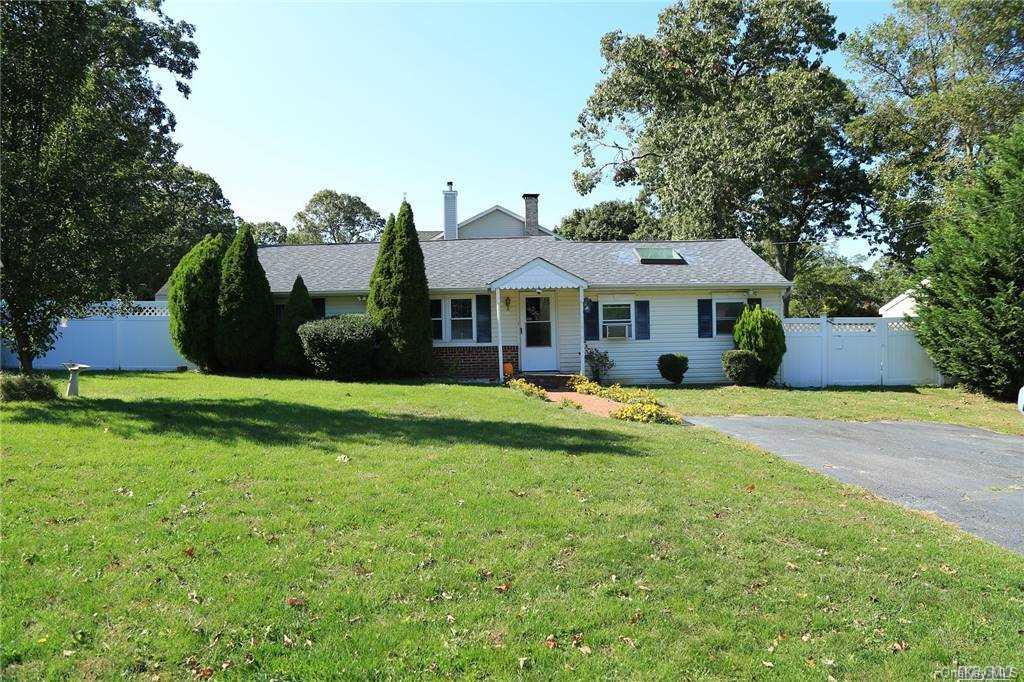 38 Blue Point Road Selden, NY 11784 - Photo 1 of 1 a view of a house with a swimming pool