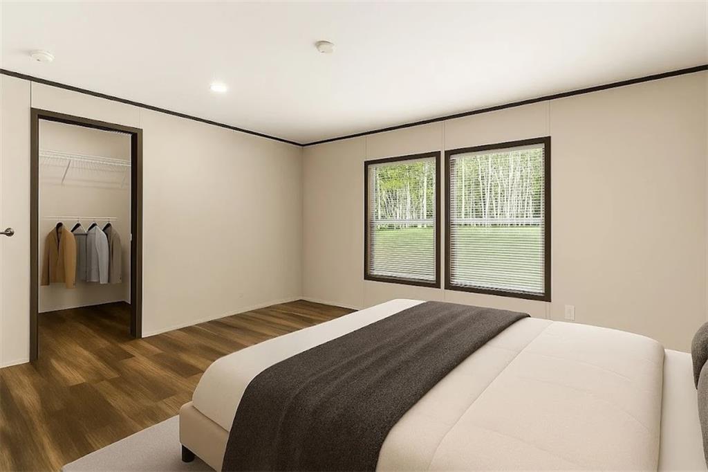 152 Wendy Hill Road Ellijay, GA 30536 - Photo 20 of 42 a bedroom with a bed and a window