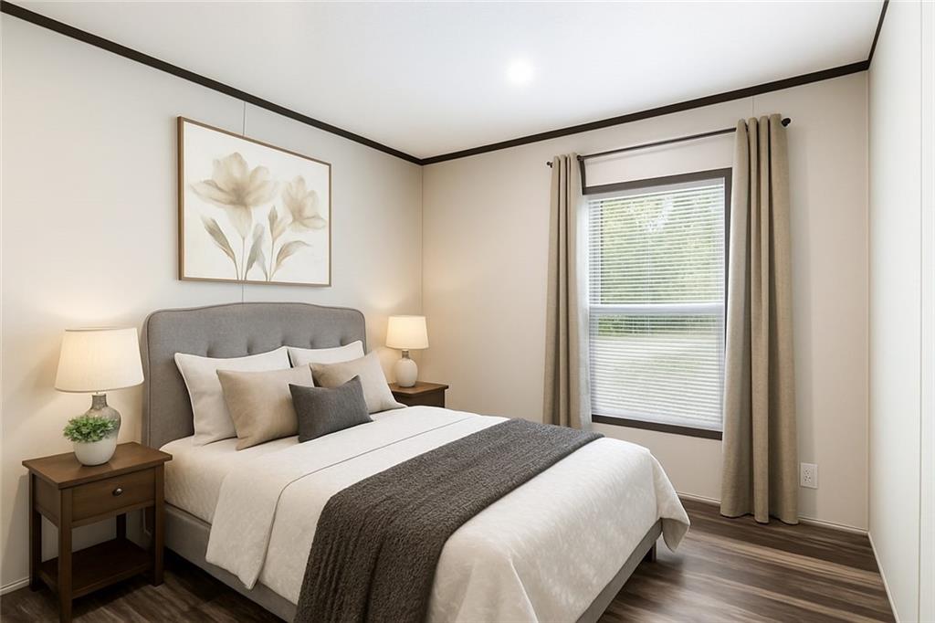 152 Wendy Hill Road Ellijay, GA 30536 - Photo 26 of 42 a bedroom with a large bed and a window