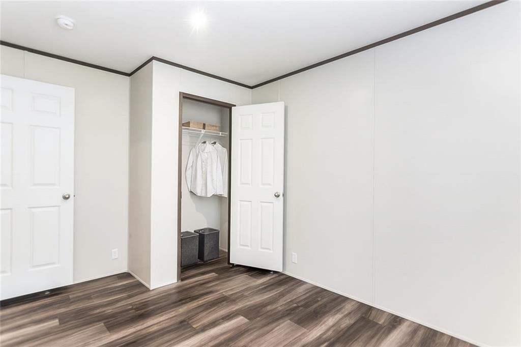 152 Wendy Hill Road Ellijay, GA 30536 - Photo 28 of 42 a view of an empty room with wooden floor
