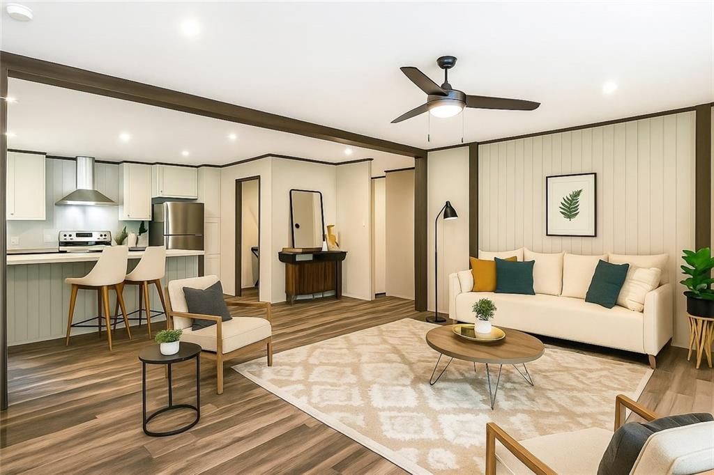 152 Wendy Hill Road Ellijay, GA 30536 - Photo 3 of 42 a living room with furniture and wooden floor