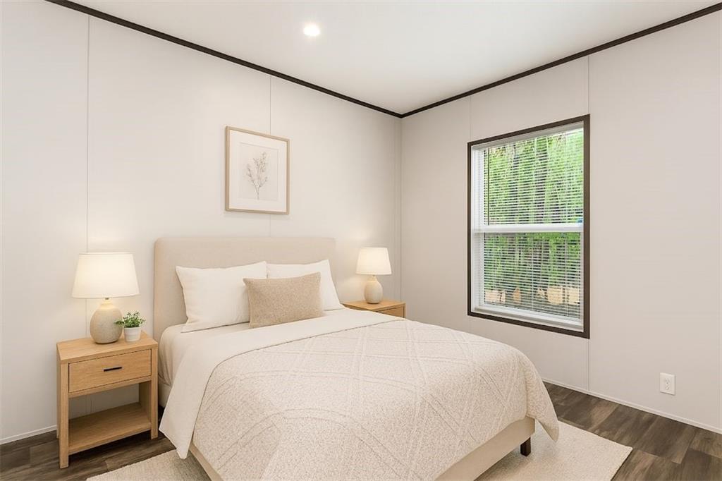 152 Wendy Hill Road Ellijay, GA 30536 - Photo 32 of 42 a bedroom with a large bed and a window