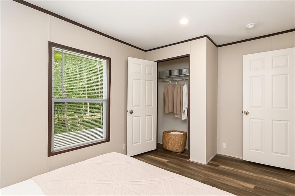 152 Wendy Hill Road Ellijay, GA 30536 - Photo 33 of 42 a view of a room that has a large window and wooden floor