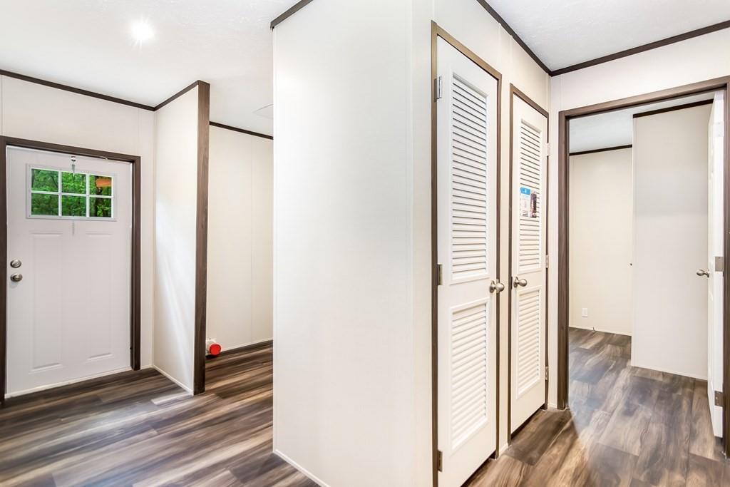 152 Wendy Hill Road Ellijay, GA 30536 - Photo 35 of 42 a view of a hallway with wooden floor and a bathroom