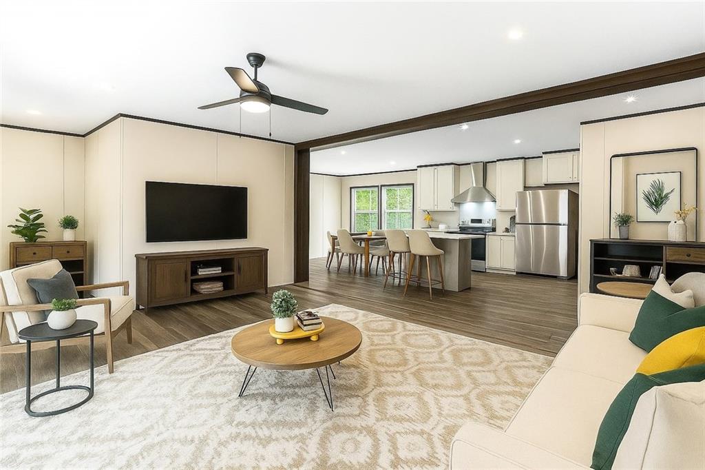 152 Wendy Hill Road Ellijay, GA 30536 - Photo 38 of 42 a living room with furniture and a flat screen tv