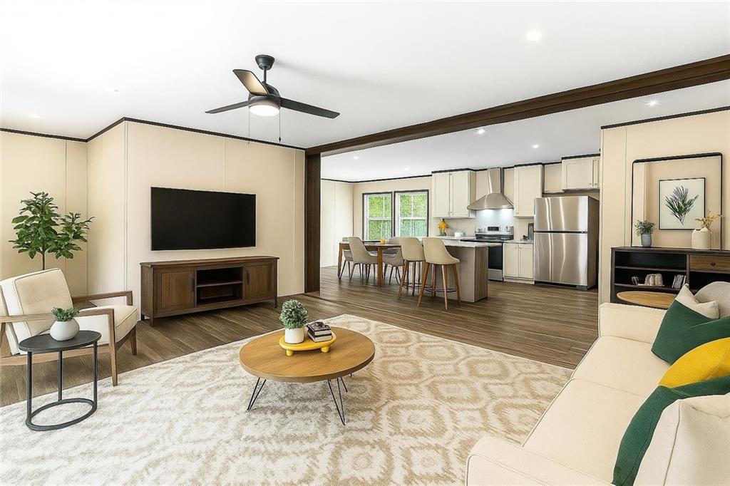 152 Wendy Hill Road Ellijay, GA 30536 - Photo 4 of 42 a living room with furniture and a flat screen tv