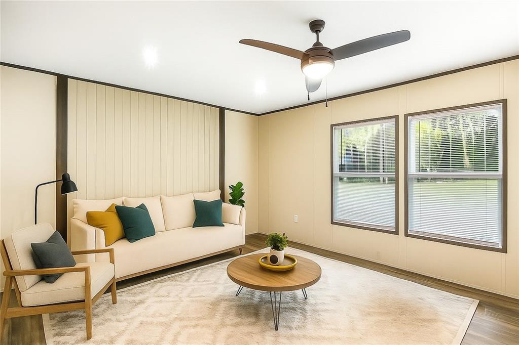 152 Wendy Hill Road Ellijay, GA 30536 - Photo 7 of 42 a living room with furniture and a large window