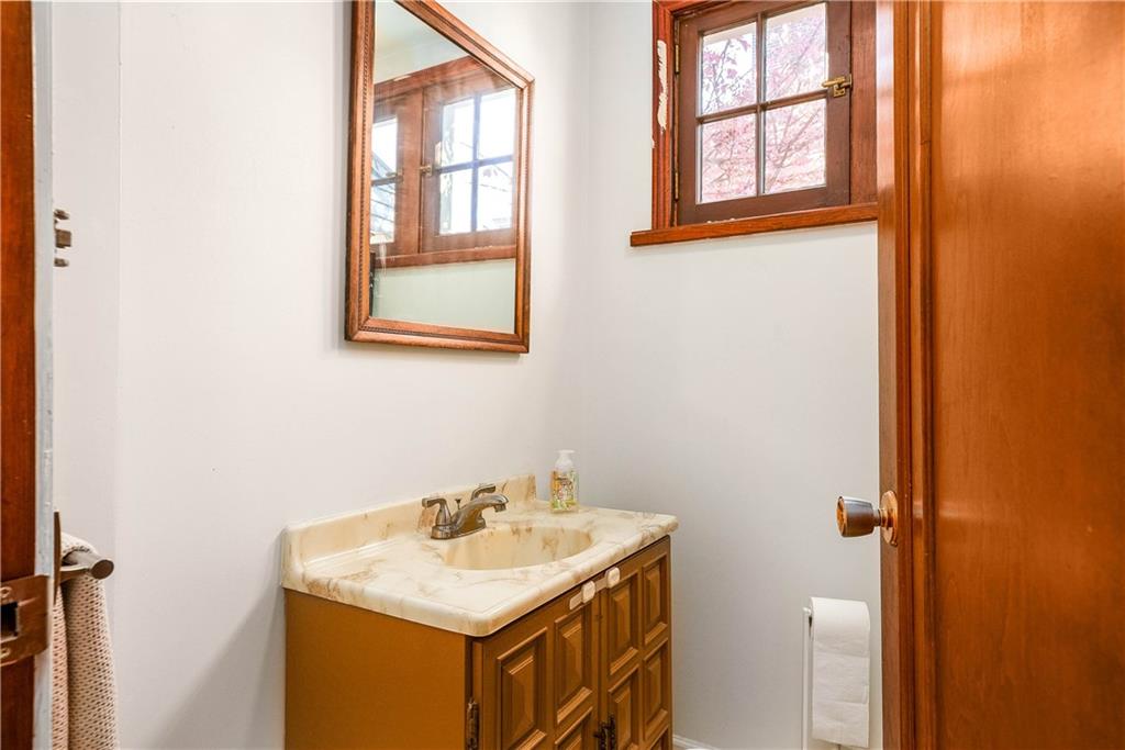 853 Collins Street Pittsburgh, PA 15206 - Photo 13 of 31 a bathroom with a sink and a window