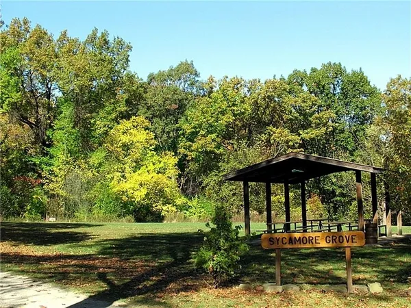 a view of a chairs and table in the patio