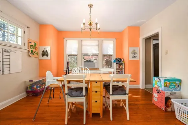a view of a dining room with furniture window and outside view