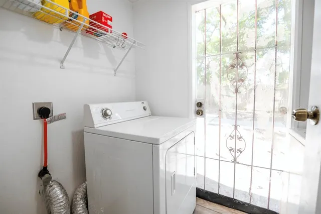 a utility room with dryer and washer
