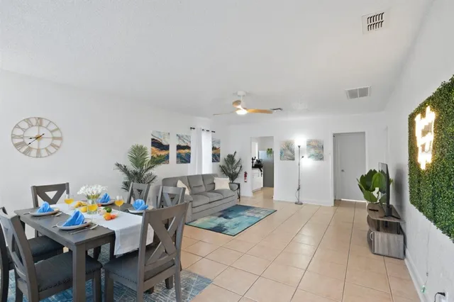 a living room with furniture and a table