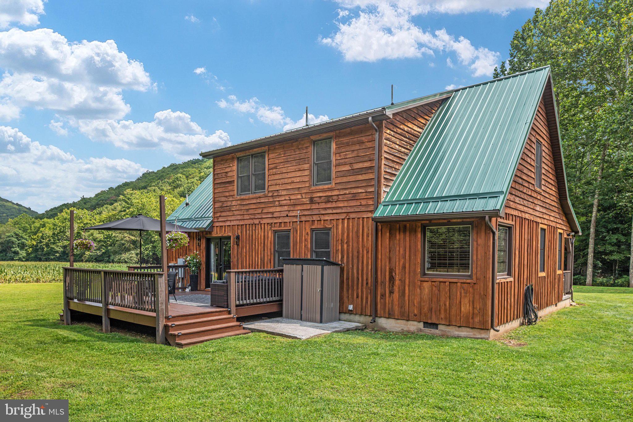 1396 Cullers Run Road Mathias, WV 26812 - Photo 46 of 79 Charming rustic home with scenic backdrop.