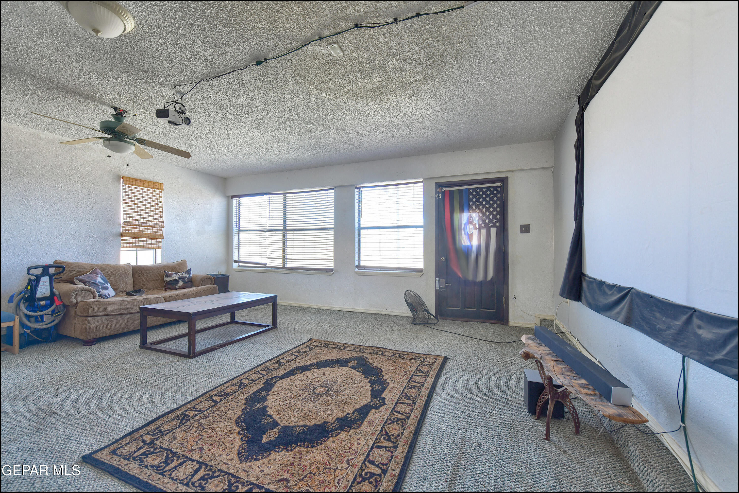 395 Gabaldon Road Anthony, NM 88021 - Photo 19 of 84 a living room with furniture and a window