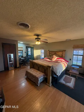a view of balcony with wooden floor