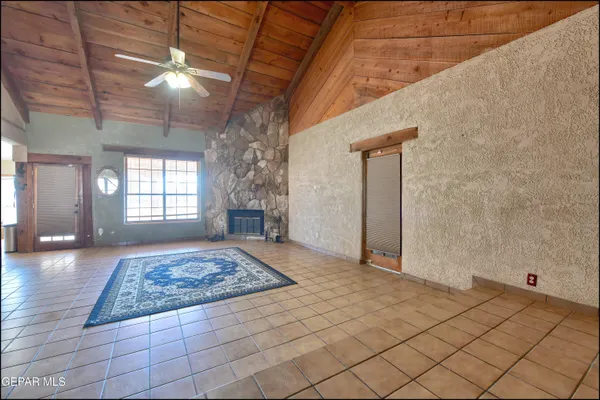 a living room with a rug