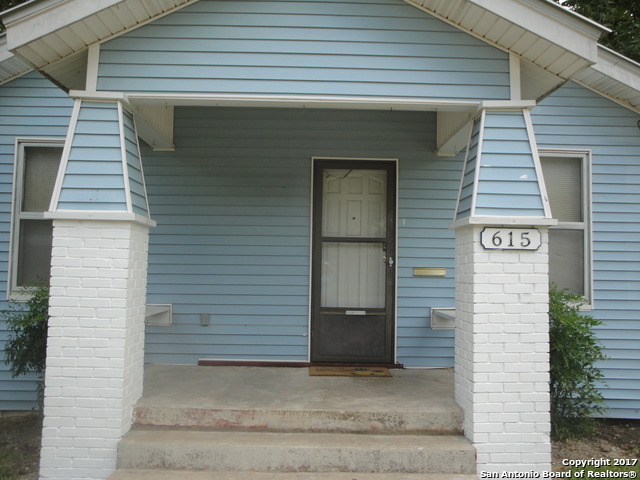 615 East Elm Street Seguin, TX 78155 - Photo 4 of 23 a front view of a house with garage