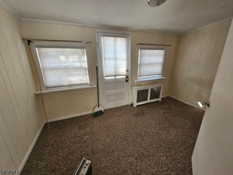 29 Ideal Street Gillette, NJ 07933 - Photo 9 of 25 an empty room with windows a fireplace