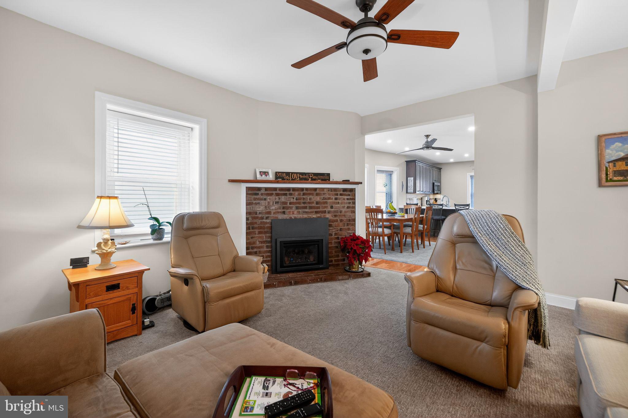 2143 Haig Avenue Morton, PA 19070 - Photo 19 of 29 a living room with furniture and a fireplace