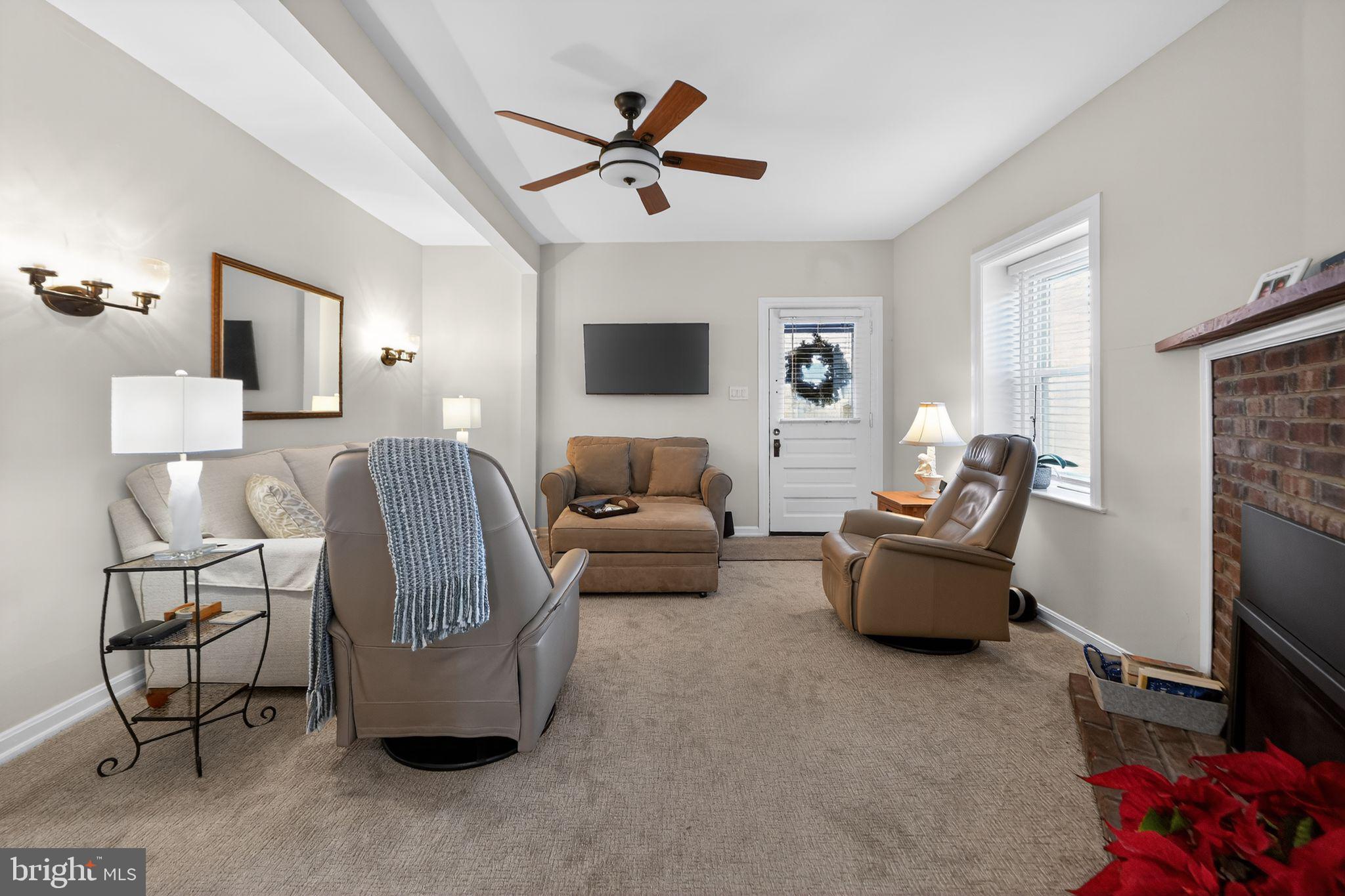 2143 Haig Avenue Morton, PA 19070 - Photo 20 of 29 a living room with furniture and a flat screen tv