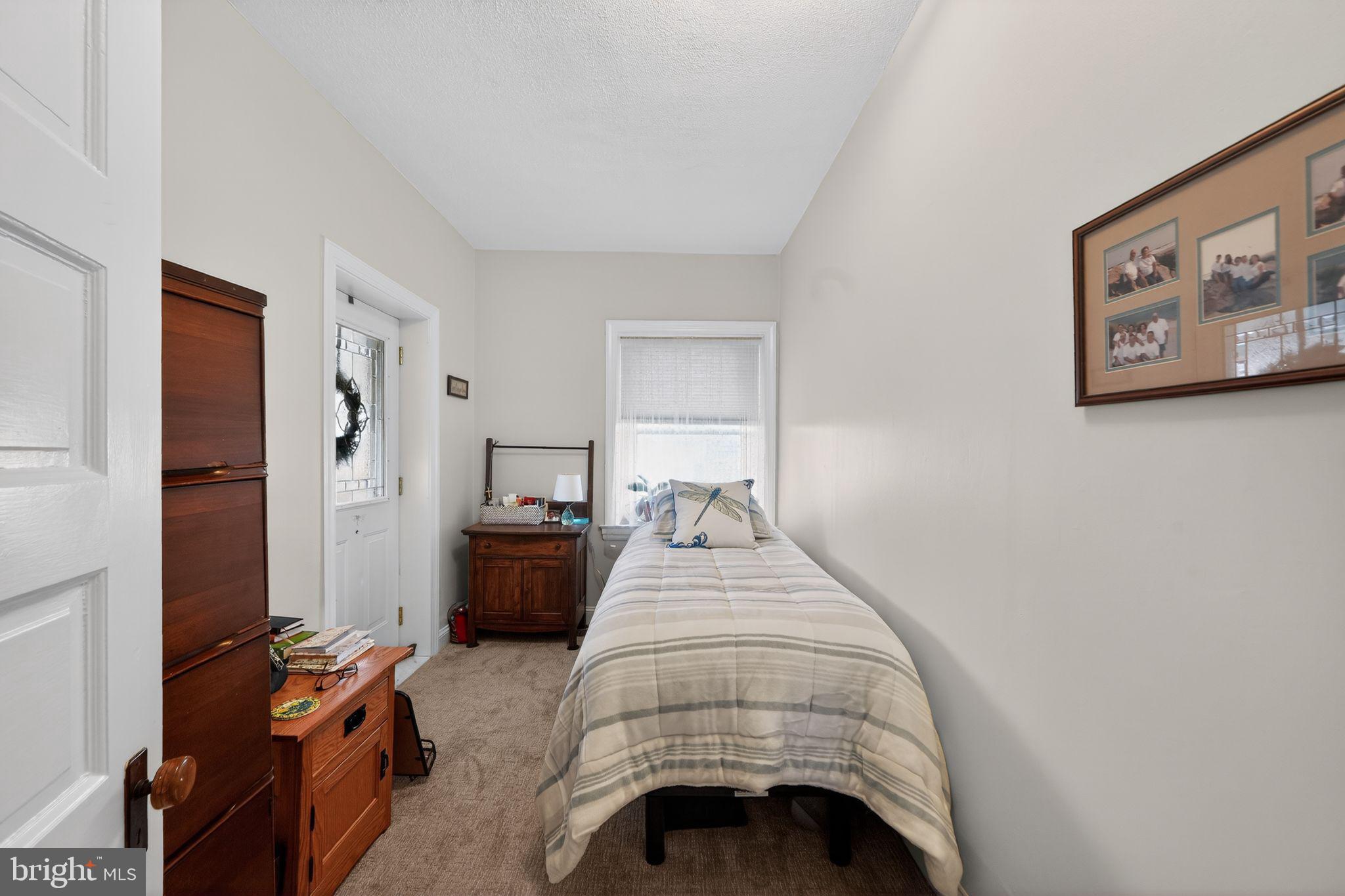 2143 Haig Avenue Morton, PA 19070 - Photo 23 of 29 a bedroom with bed and a window