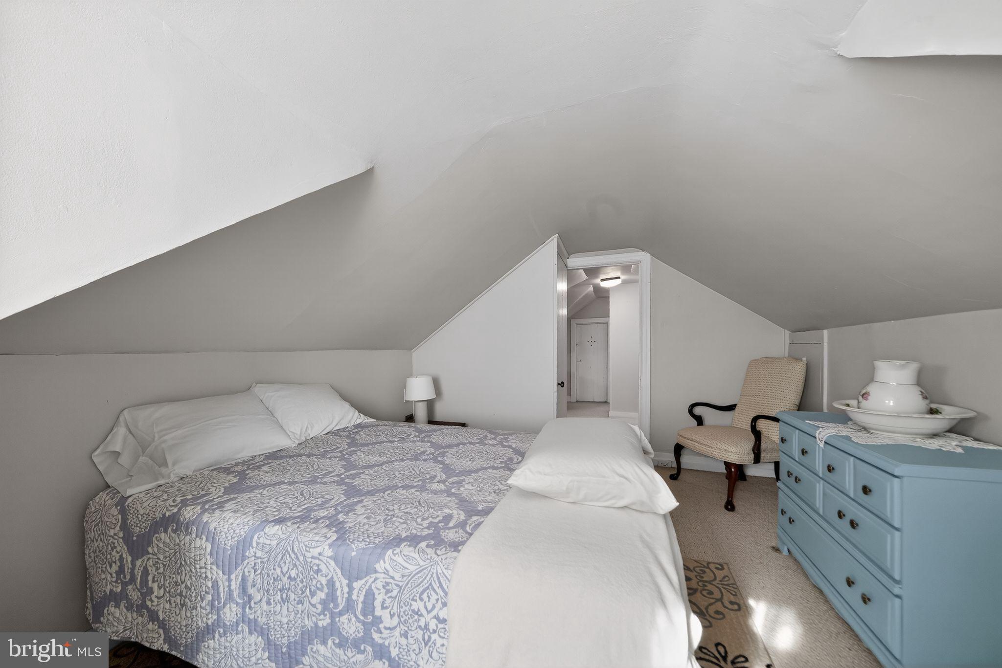 2143 Haig Avenue Morton, PA 19070 - Photo 28 of 29 a bed room with a bed and a lamp