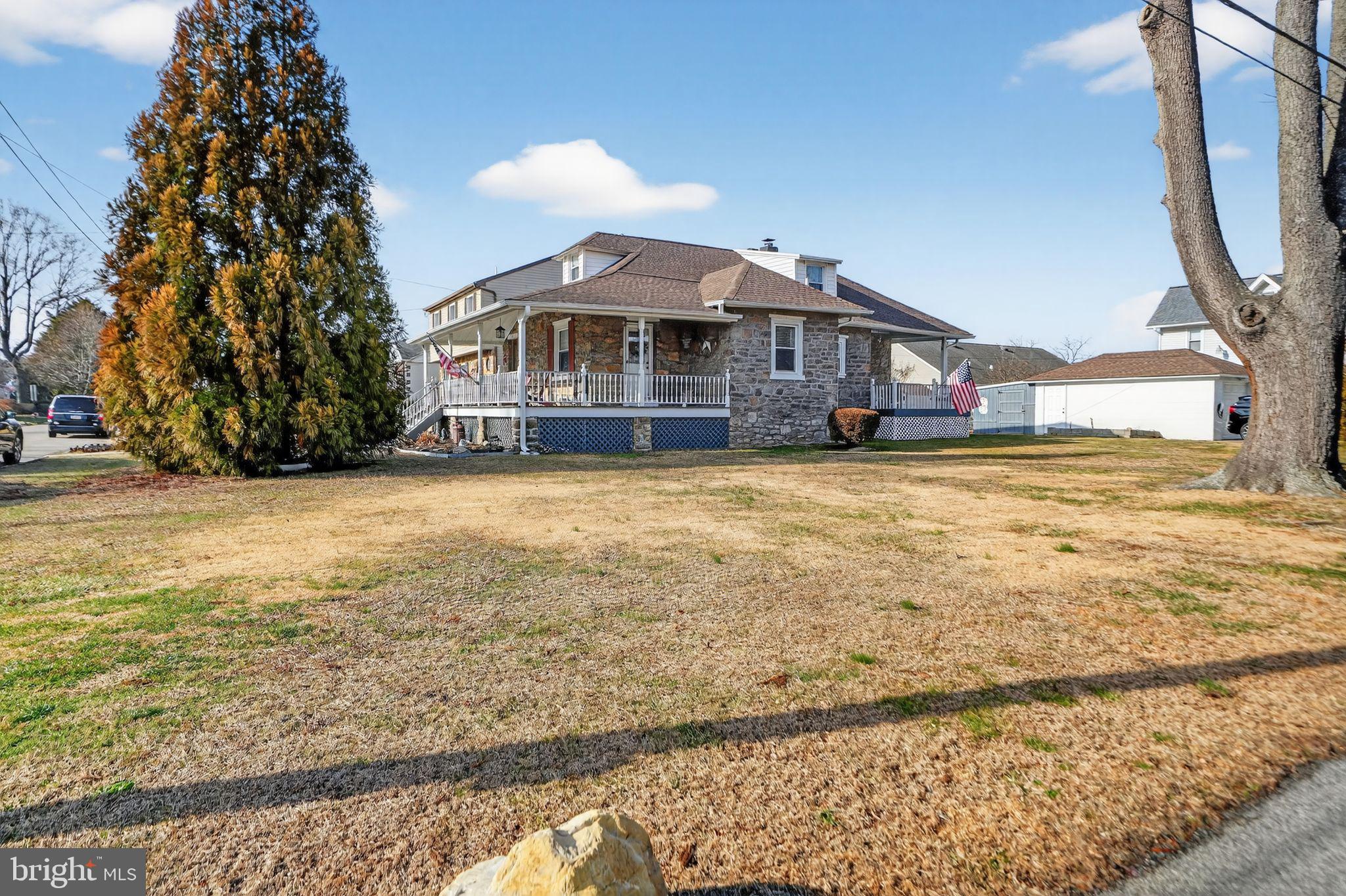 2143 Haig Avenue Morton, PA 19070 - Photo 5 of 29 a front view of a house with a yard