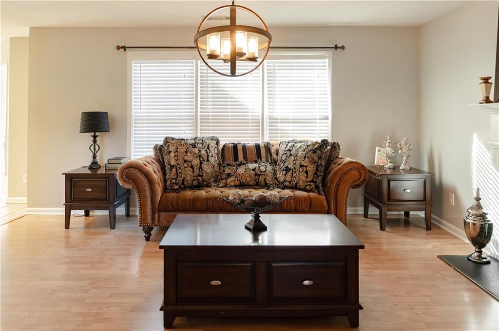 1004 Cavesson Terrace Lawrenceville, GA 30045 - Photo 11 of 48 a living room with furniture and a window