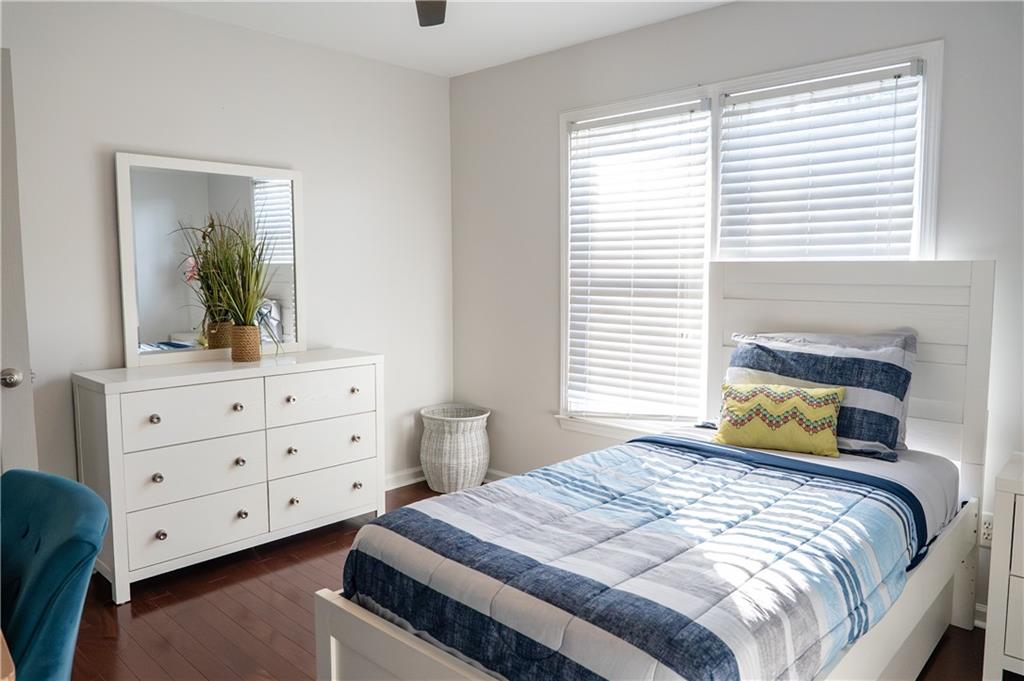 1004 Cavesson Terrace Lawrenceville, GA 30045 - Photo 23 of 48 a bedroom with a bed and a dresser