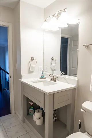 a bathroom with a sink and a toilet